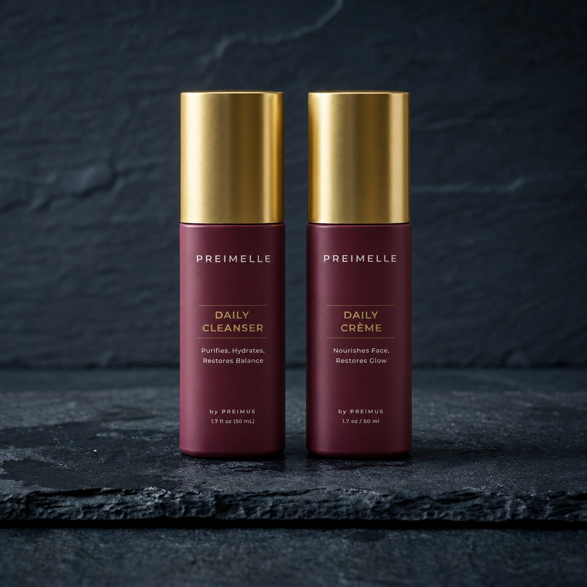 PREIMELLE ORIGIN System: Daily Cleanser and Daily Crème on dark slate